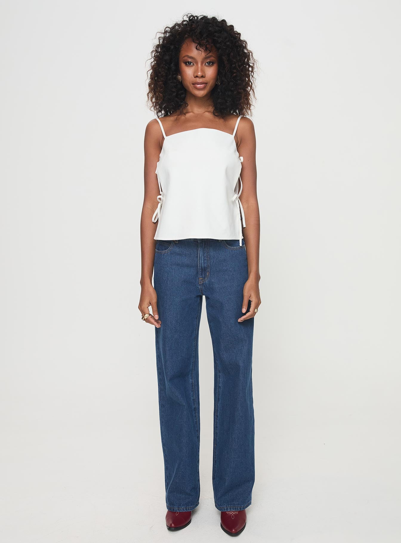 front view of model wearing Princess Polly Novalie Top White Sleeveless Square Neck 