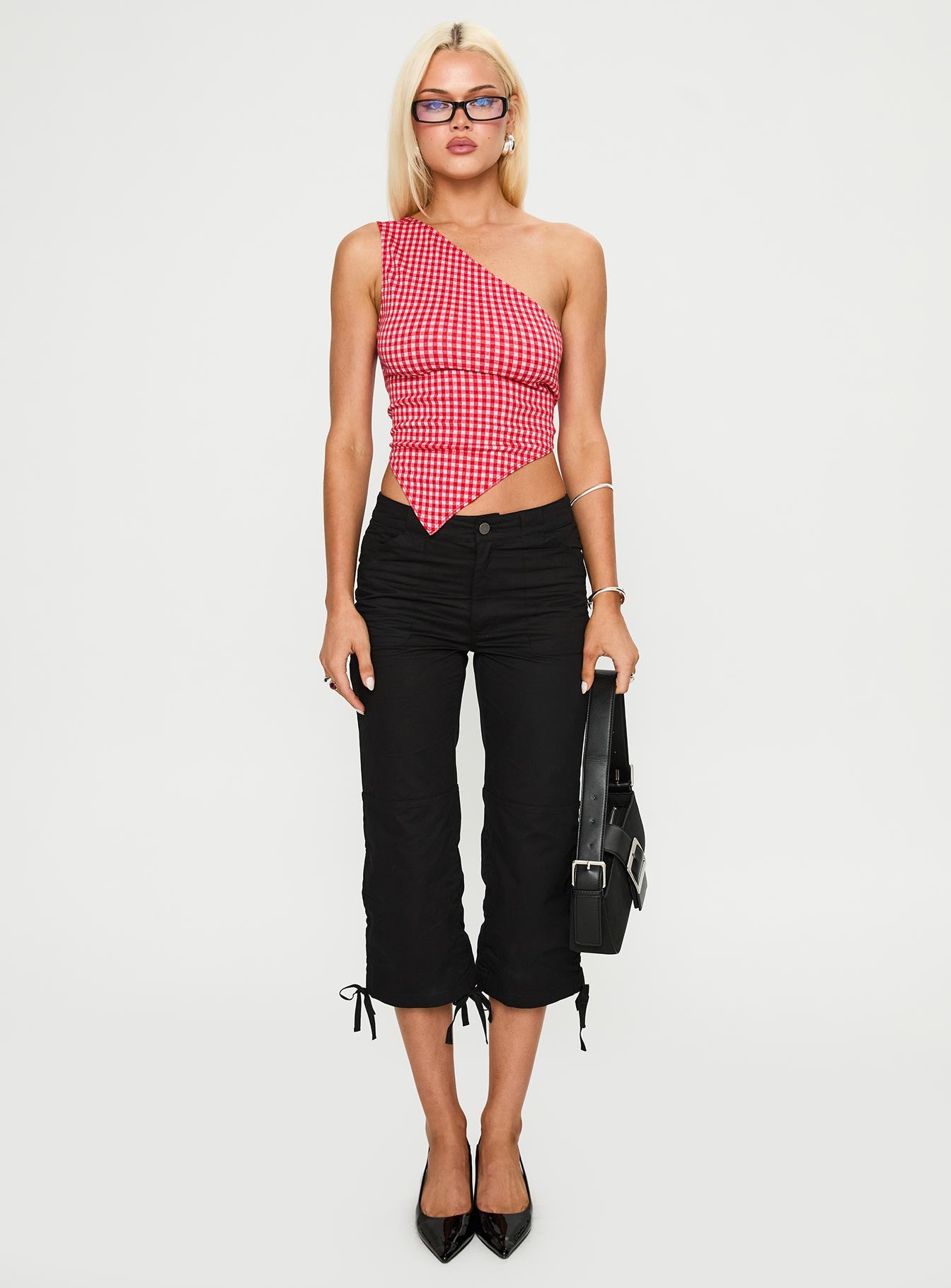 front view of model wearing Princess Polly Sunday Sunrise Tie Back Top Red Check Sleeveless Asymmetric Neckline 