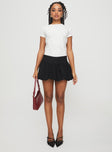   side view of model wearing Princess Polly Mersale Bubble Hem Mini Skirt Black Mini Skirts 