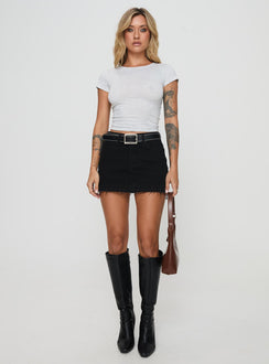 back view of model wearing Princess Polly Aster Mini Skirt Black Mini Skirts 