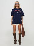 front view of model wearing Princess Polly Goal France Oversized Tee Blue Half Sleeves Crew Neck 