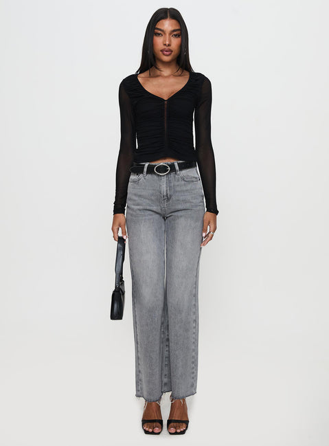 side view of model wearing Princess Polly Tenzin Ruched Top Black Full Sleeves V-Neck 