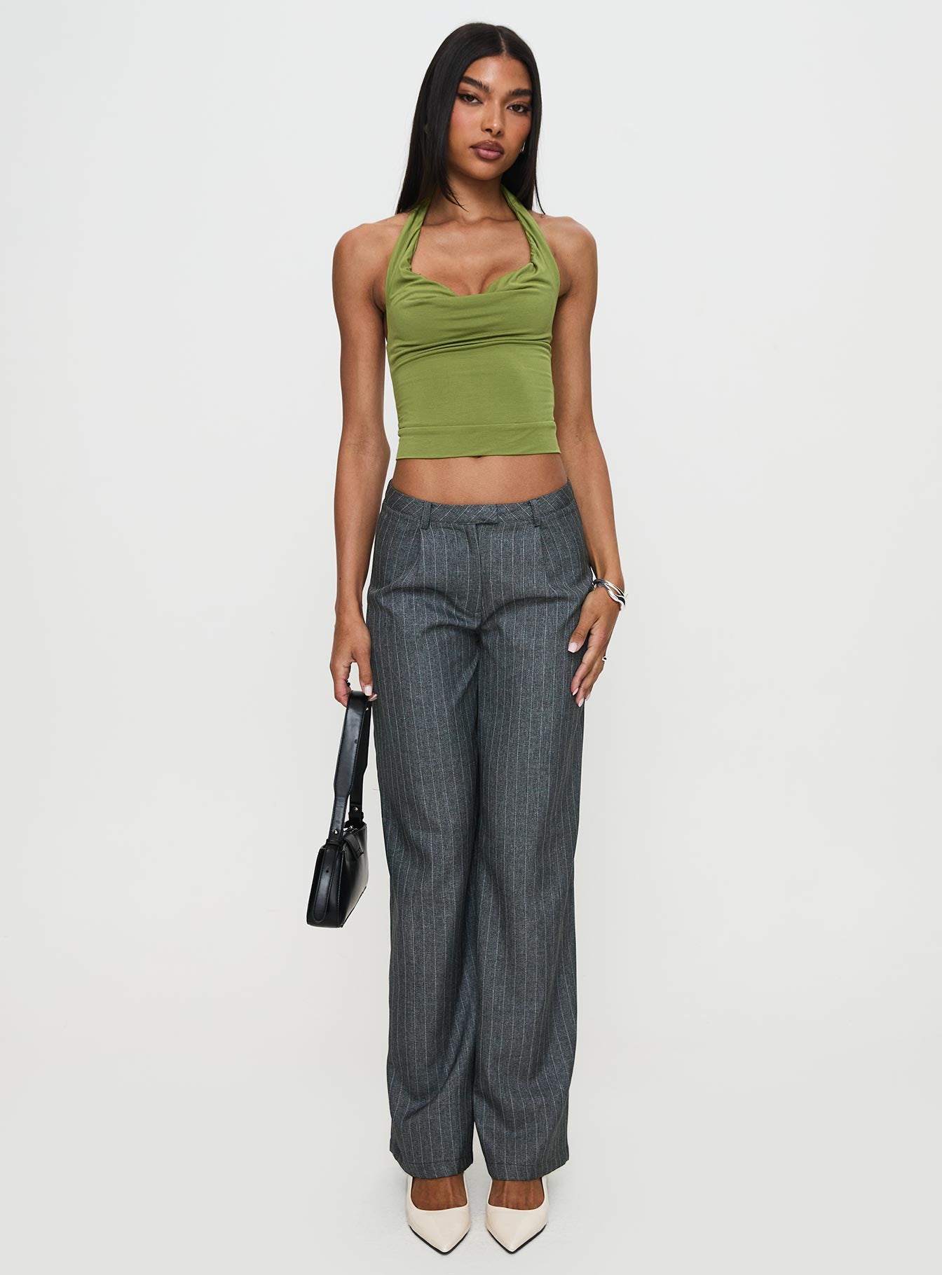 side view of model wearing Princess Polly Broadcast Pants Grey Pinstripe Low Rise Pants 
