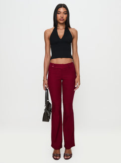 front view of model wearing Princess Polly Kinkirk Flared Pants Burgundy Low Rise Pants 