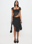   front view of model wearing Princess Polly Legacy Midi Skirt Onyx Polka 