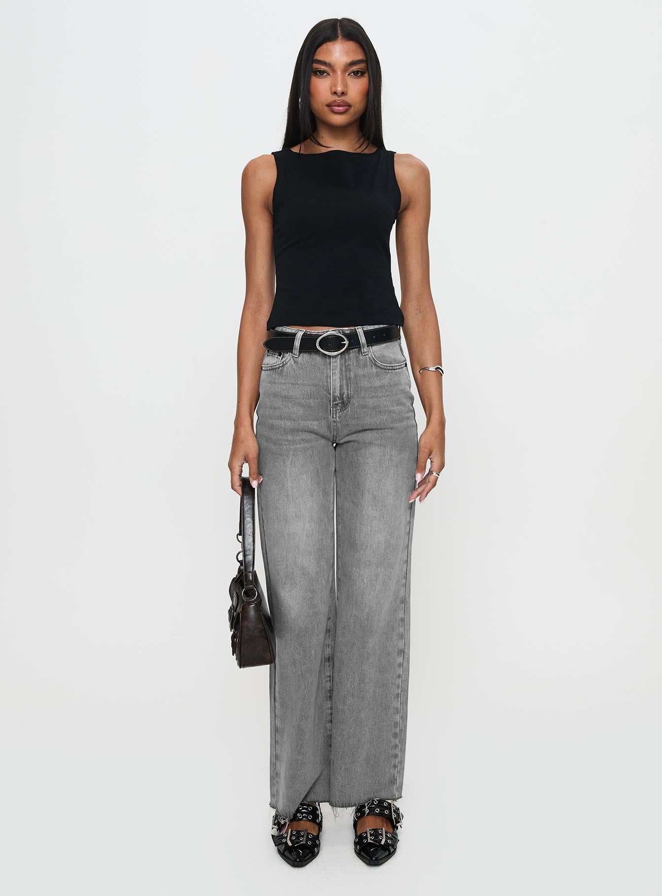 front view of model wearing Princess Polly Henesey Raw Hem Jeans Washed Grey High Waisted 