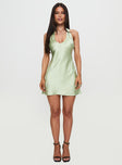 side view of model wearing Princess Polly Mysteria Halter Mini Dress Green Plunger 