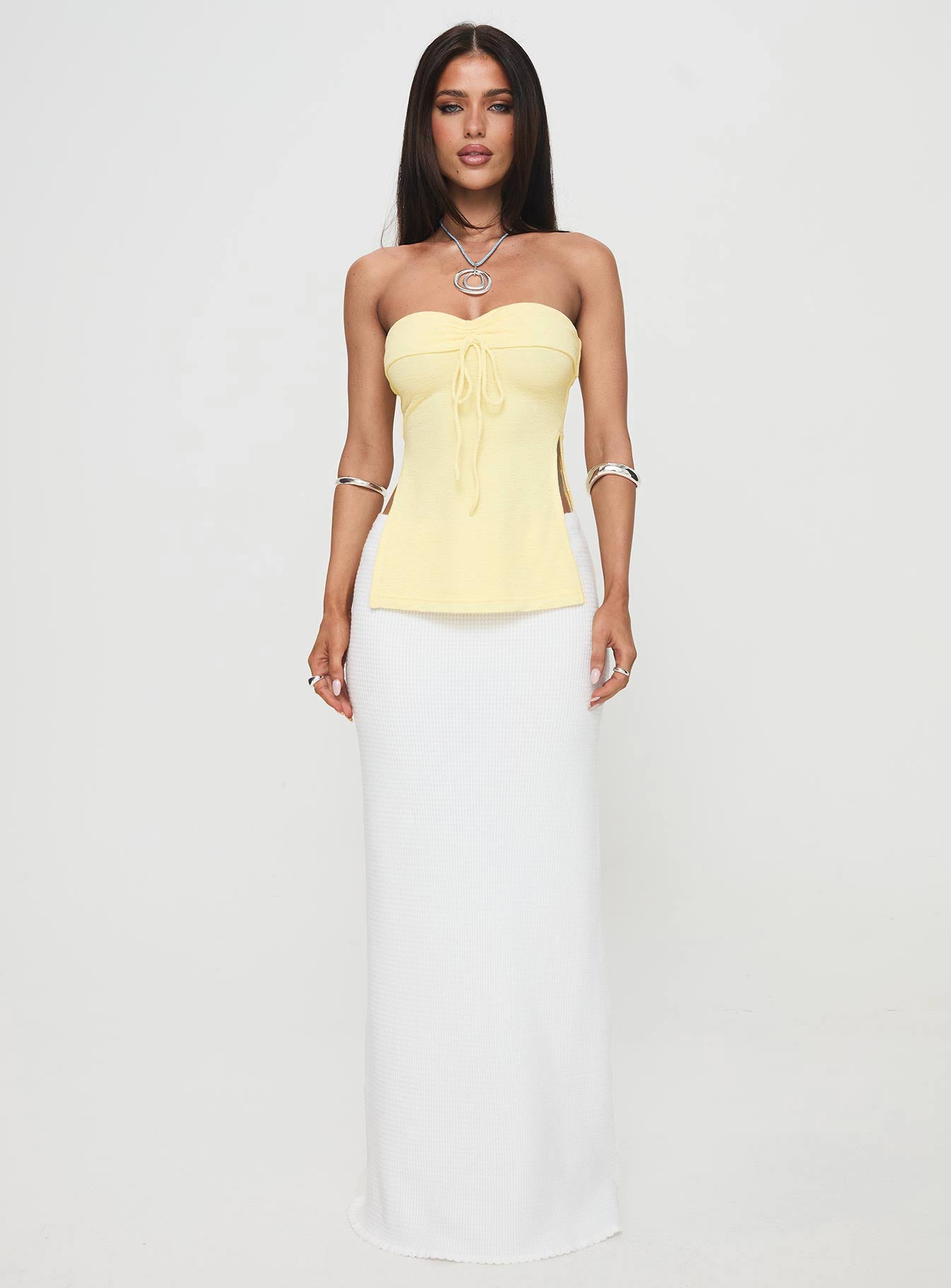 front view of model wearing Princess Polly Laurenita Longline Tube Top Yellow Sleeveless Sweetheart 