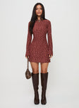 side view of model wearing Princess Polly Primrosa Long Sleeve Mini Dress Burgundy High Neck 