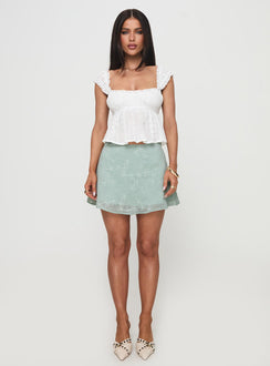 back view of model wearing Princess Polly All My Friends Mini Skirt Green Mini Skirts 