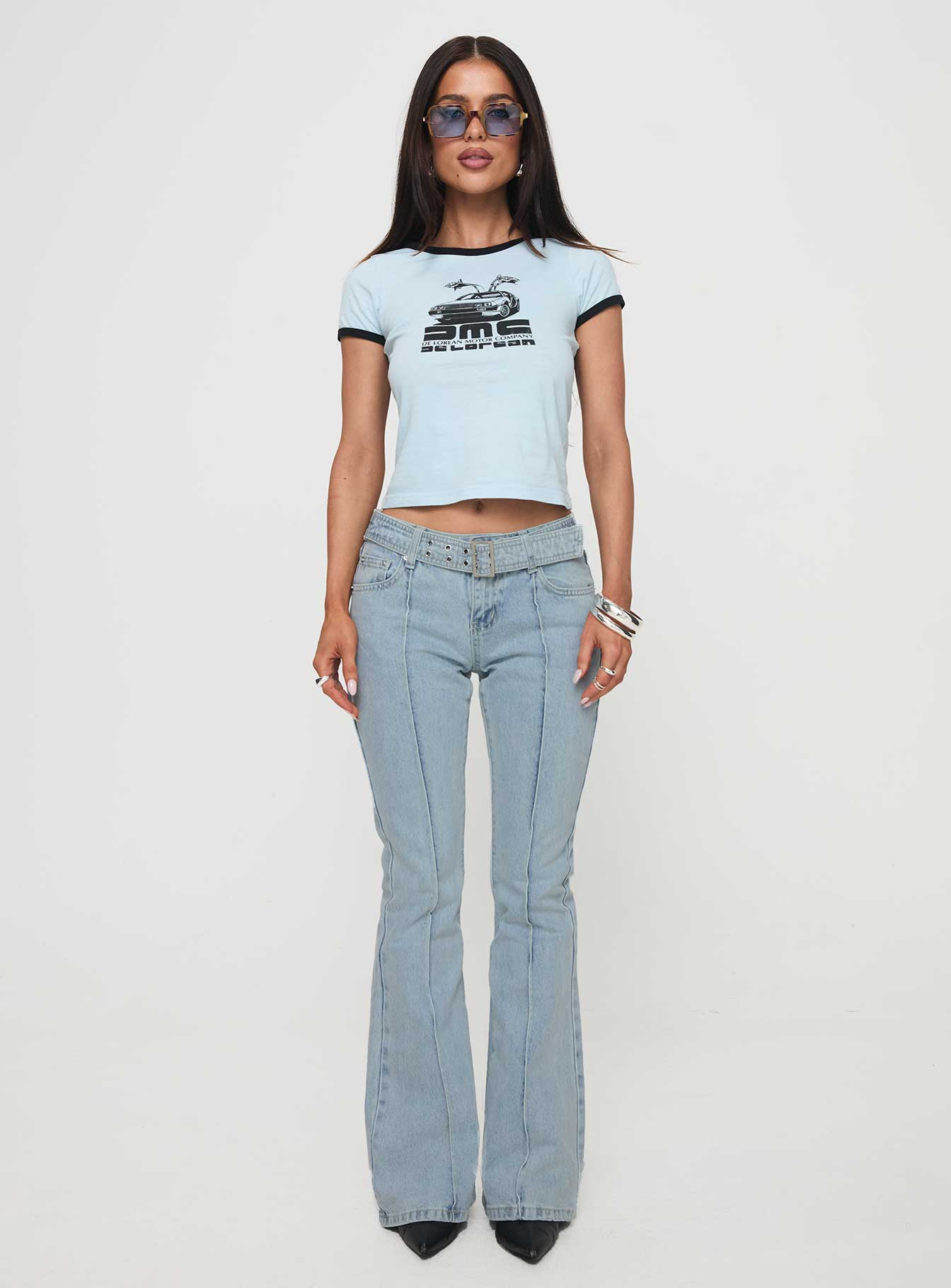 front view of model wearing Princess Polly Echovalley Low Rise Jeans Light Wash Mid Rise 