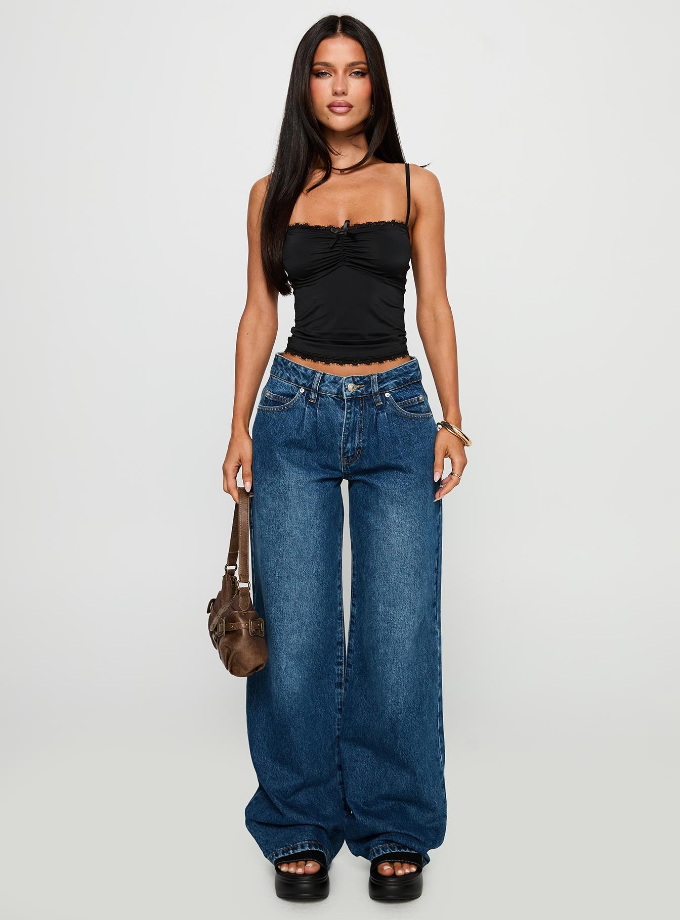 front view of model wearing Princess Polly Duster Oversized Jeans Dark Wash Mid Rise 