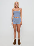 side view of model wearing Princess Polly Winslet Low Rise Short Blue Stripe Low Rise Shorts 