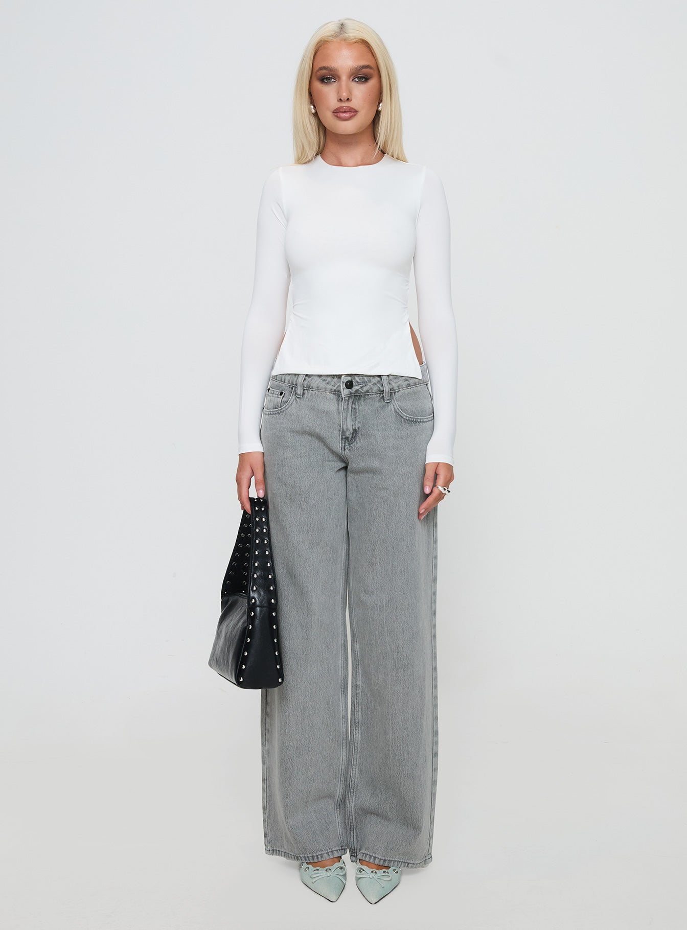 front view of model wearing Princess Polly Ellanor Low Rise Slouch Denim Jean Washed Grey Mid Rise 