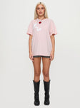 back view of model wearing Princess Polly Asta Oversized Tee Pink Half Sleeves Crew Neck 