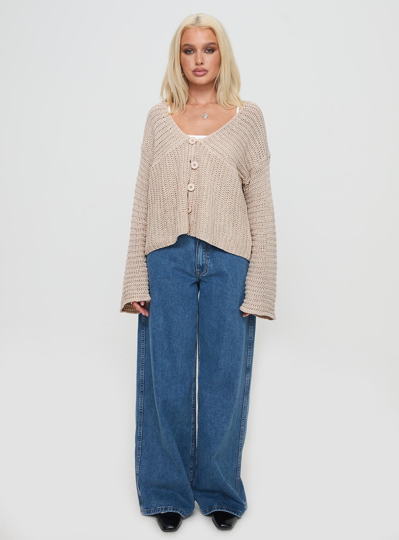 side view of model wearing Princess Polly Maela Knit Cardigan Mocha Cropped 