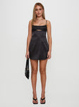 front view of model wearing Princess Polly Powell Mini Dress Black Square Neck 