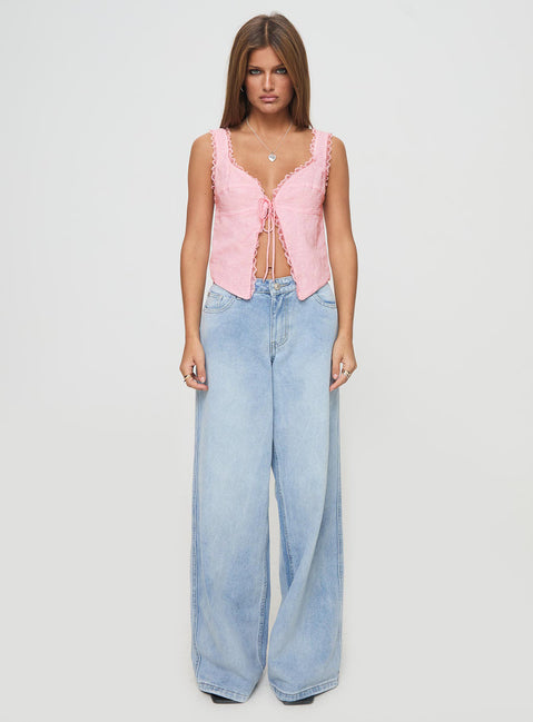 back view of model wearing Princess Polly Merrelle Top Pink Sleeveless Plunger 