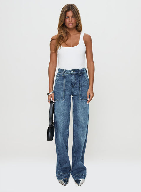 front view of model wearing Princess Polly Carsen Wide Leg Jeans Washed Blue High Waisted 