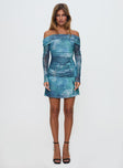 side view of model wearing Princess Polly Olympique Long Sleeve Mini Dress Blue Multi Straight Neck 