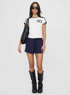 front view of model wearing Princess Polly Gavine Shorts Navy mid-rise 