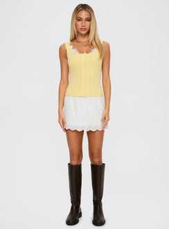 front view of model wearing Princess Polly Sole Purpose Lace Trim Top Yellow Sleeveless Scoop Neck 