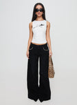 front view of model wearing Princess Polly Pearlisle Baggy Jeans Black Low Rise Jeans 