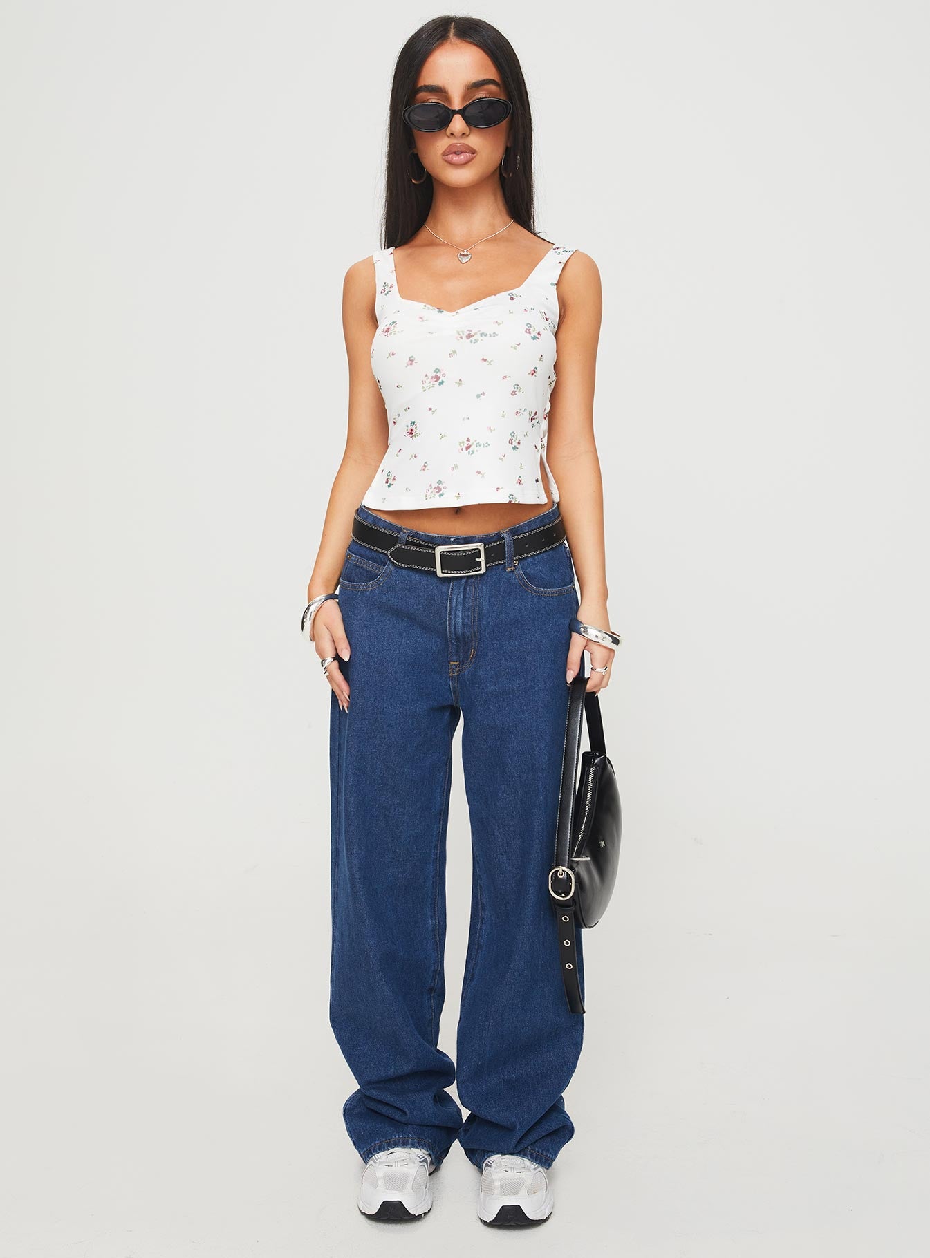 front view of model wearing Princess Polly Rehna Top White Floral Sleeveless V-Neck 