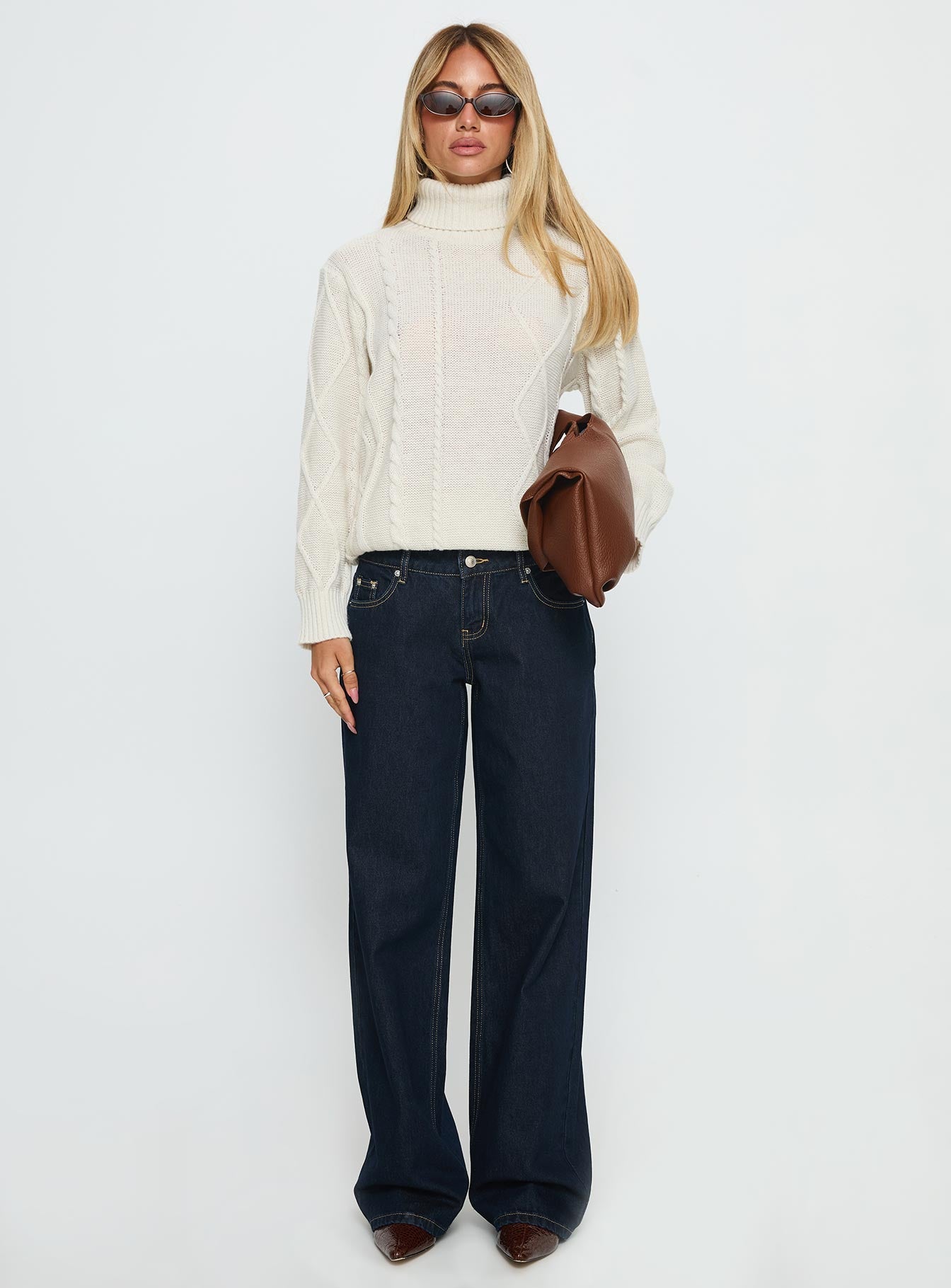 front view of model wearing Princess Polly Tarynne Cable Knit Turtle Neck Sweater Beige Long 