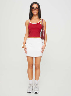 front view of model wearing Princess Polly Tex Skort White / Red 