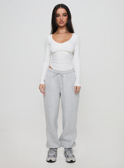 side view of model wearing Princess Polly Lunella Bodysuit White Full Sleeves 