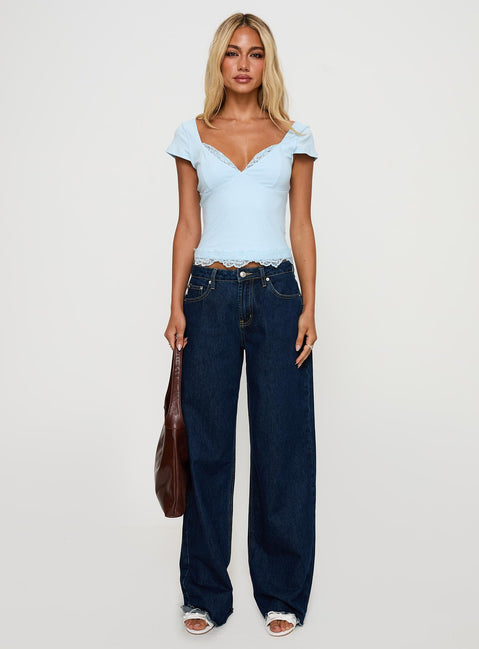 side view of model wearing Princess Polly Full Of Wonder Top Blue Short Sleeves V-Neck 