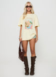 side view of model wearing Princess Polly Hotel Hawaii Oversized Tee Yellow Half Sleeves Crew Neck 