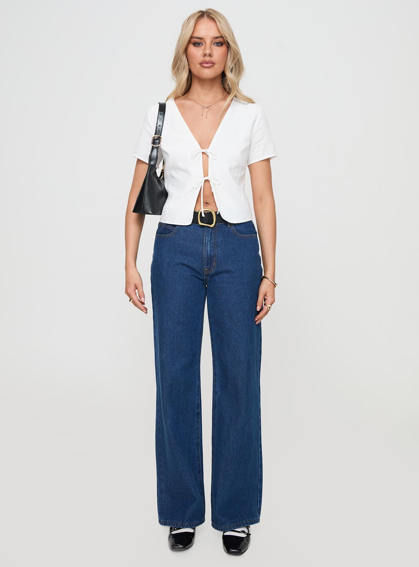 front view of model wearing Princess Polly Corriander Shirt White Short Sleeves V-Neck 