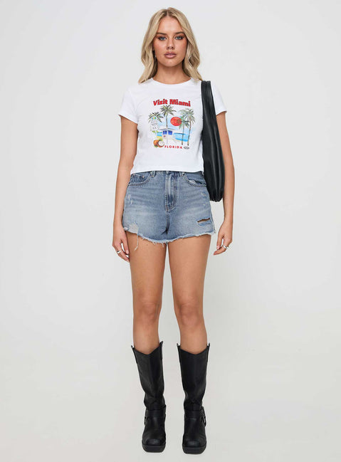 front view of model wearing Princess Polly Gratzi Mid Rise Denim Shorts Blue High Waisted Shorts 