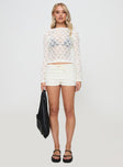 side view of model wearing Princess Polly Maddalyn Crochet Top White Full Sleeves Boat Neck 