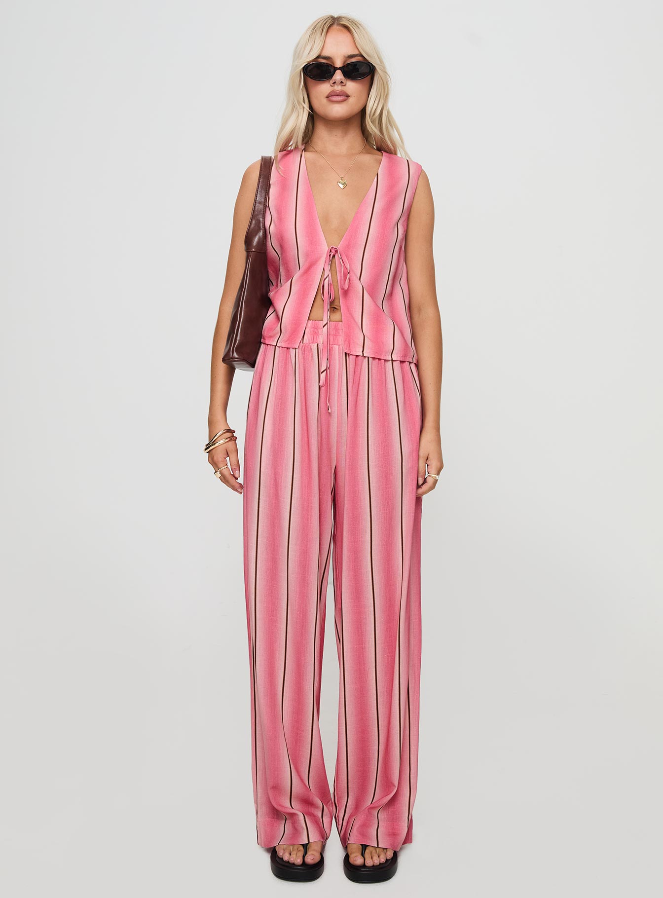 front view of model wearing Princess Polly Gentle Vest Top Pink Sleeveless Plunger 