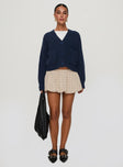 front view of model wearing Princess Polly Osias Cable Knit Cardigan Navy Cropped 