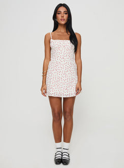 side view of model wearing Princess Polly Foleys Mini Dress White / Red Floral Square Neck 