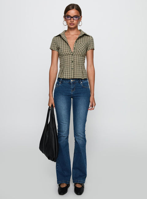 side view of model wearing Princess Polly Alma Mater Top Green Check Short Sleeves V-Neck 