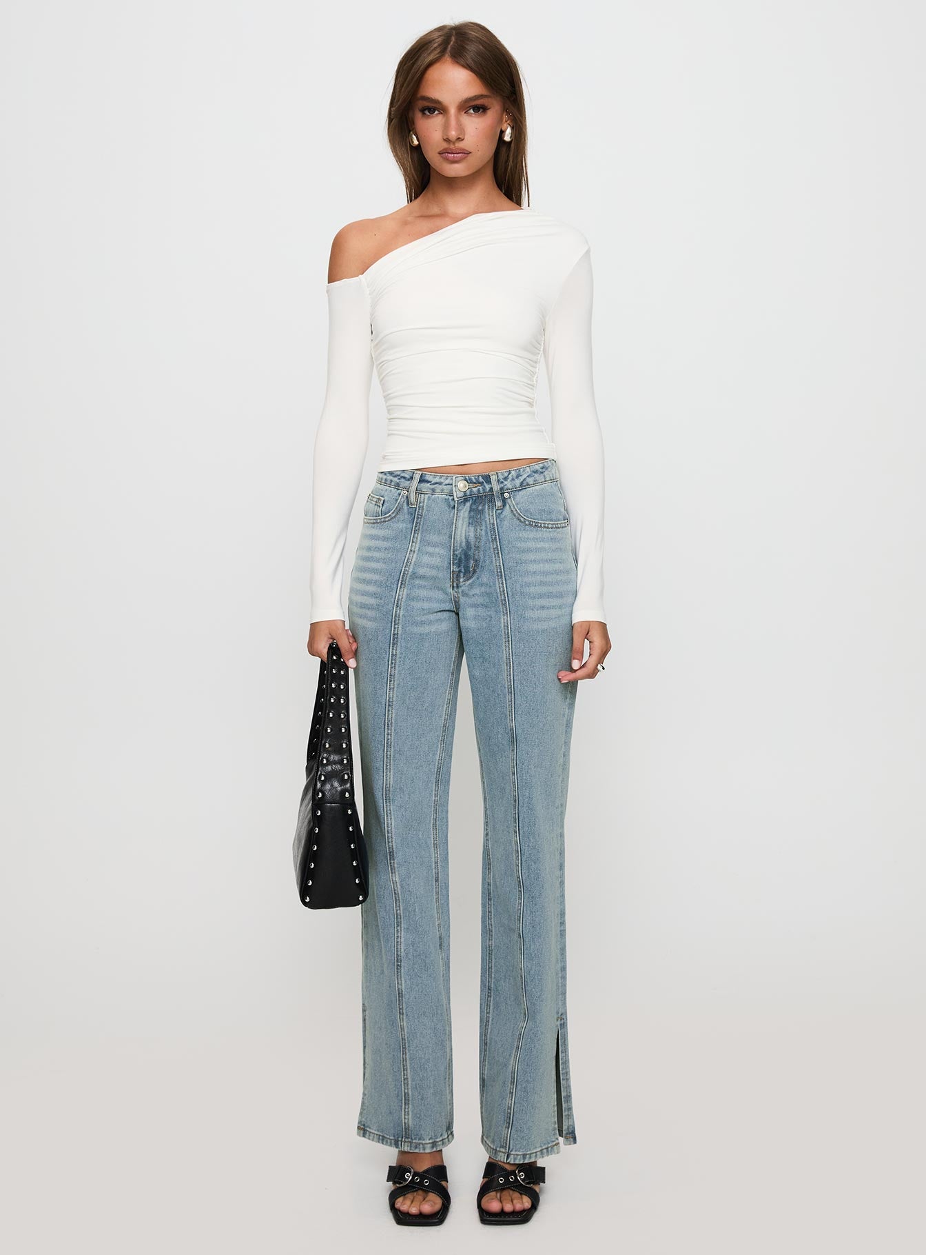 front view of model wearing Princess Polly White Mustang Side Split Jean Light Blue Mid Rise 