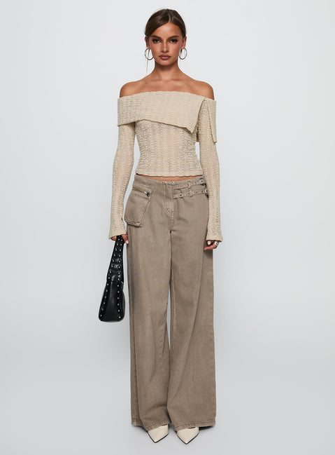 side view of model wearing Princess Polly Cardamom Long Sleeve Top Beige Full Sleeves straight 