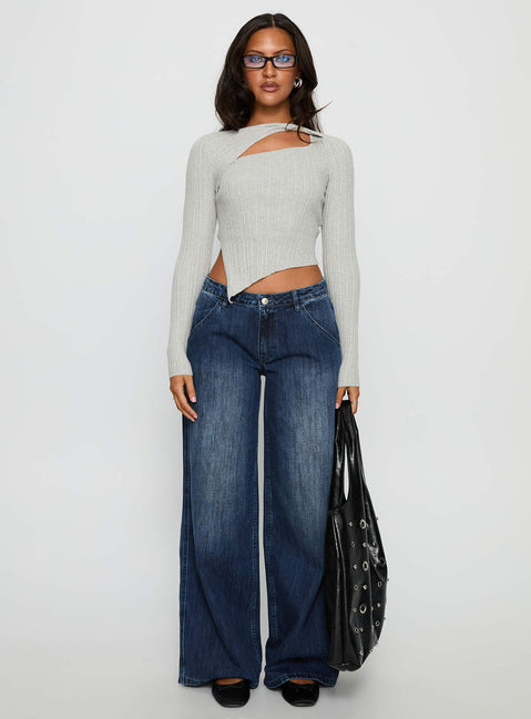 front view of model wearing Princess Polly Downtowner Low Rise Cargo Jeans Mid Blue Wash Low Rise Jeans 