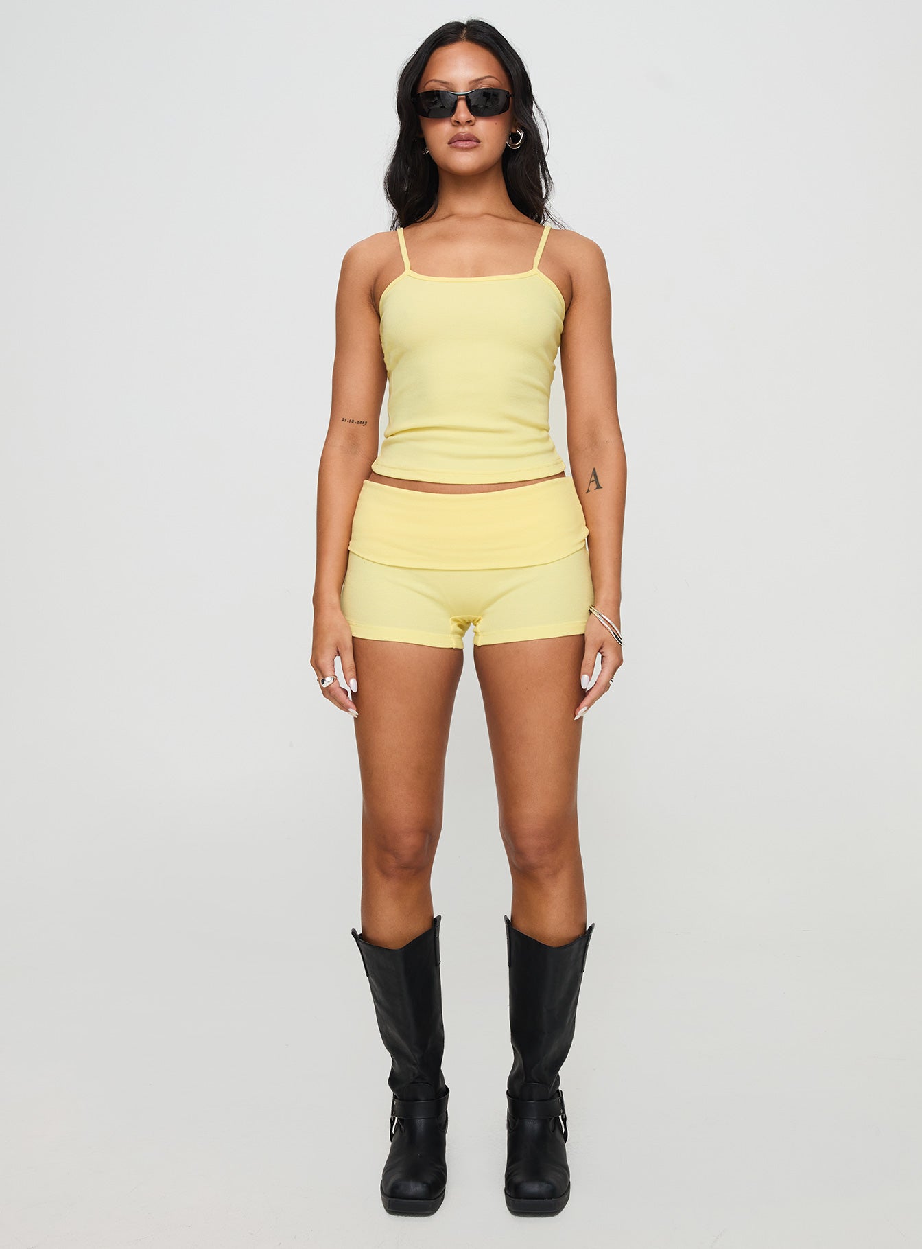 front view of model wearing Princess Polly Baseline Rib Top Yellow Sleeveless Square Neck 