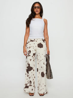 front view of model wearing Princess Polly Big Dreamer Low Rise Straight Leg Jeans Cow Print Low Rise Jeans 