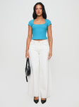 side view of model wearing Princess Polly Baseline Square Neck Rib Top Blue Short Sleeves Square Neck 