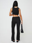 Rib-knit matching set Vest top, v-neckline, button fastening at front, split hem High-rise pants, elasticated waistband, straight leg