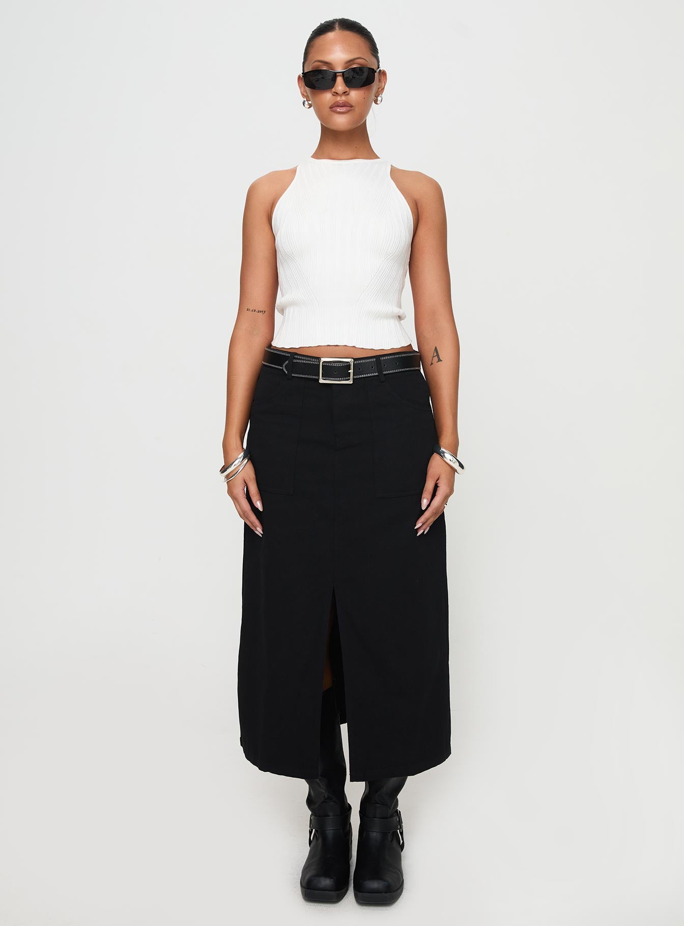   front view of model wearing Princess Polly Sumac Midi Skirt Black Midi Skirts 