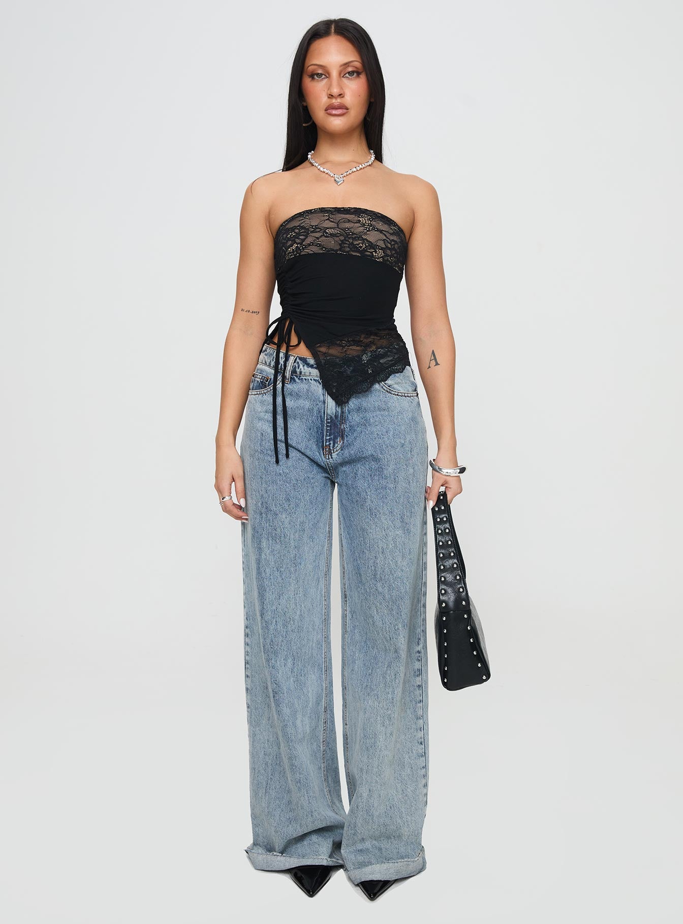 front view of model wearing Princess Polly Chianti Strapless Top Black Sleeveless straight 