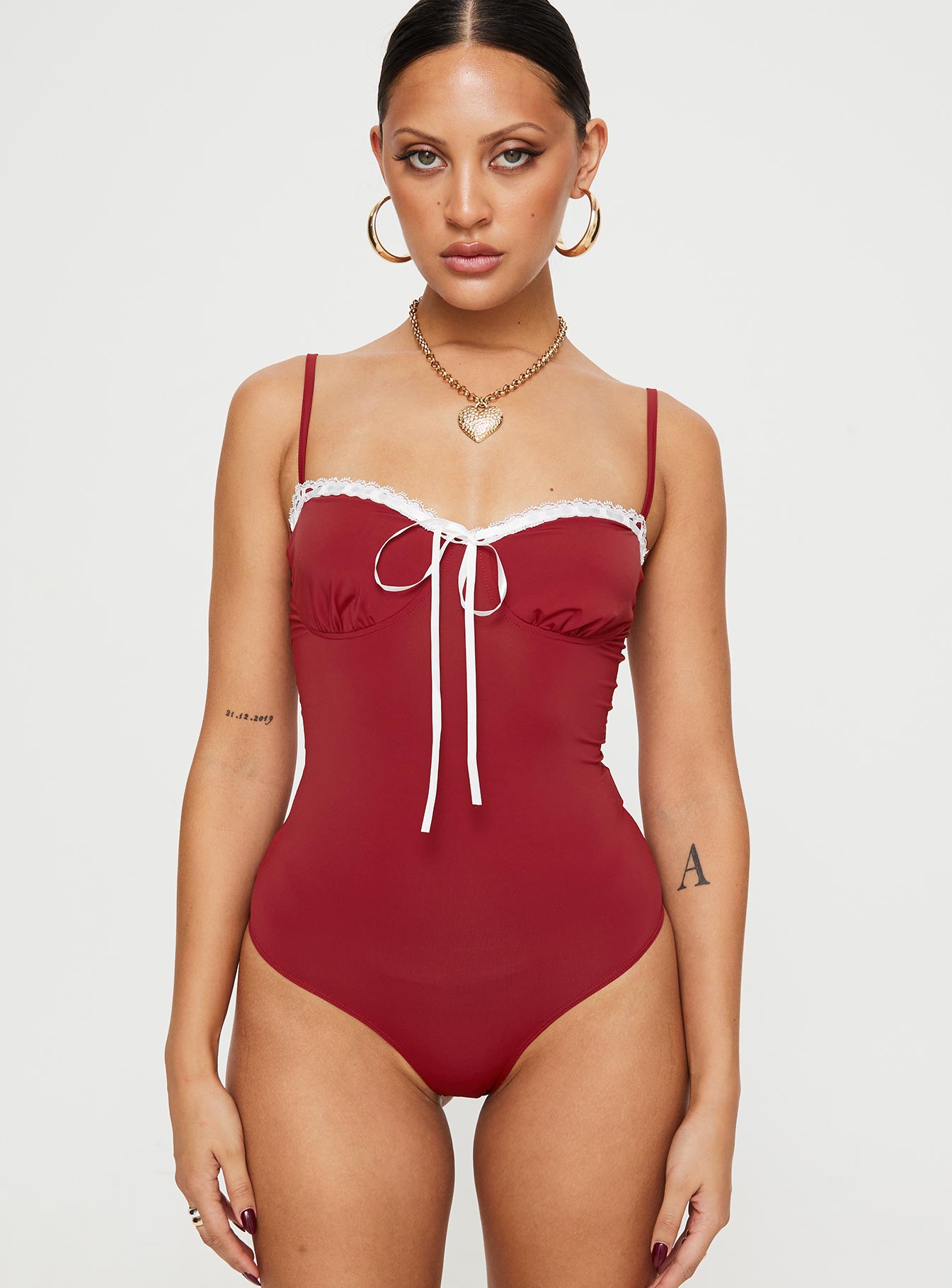 front view of model wearing Princess Polly Damsel Bodysuit Burgundy Sleeveless Sweetheart 